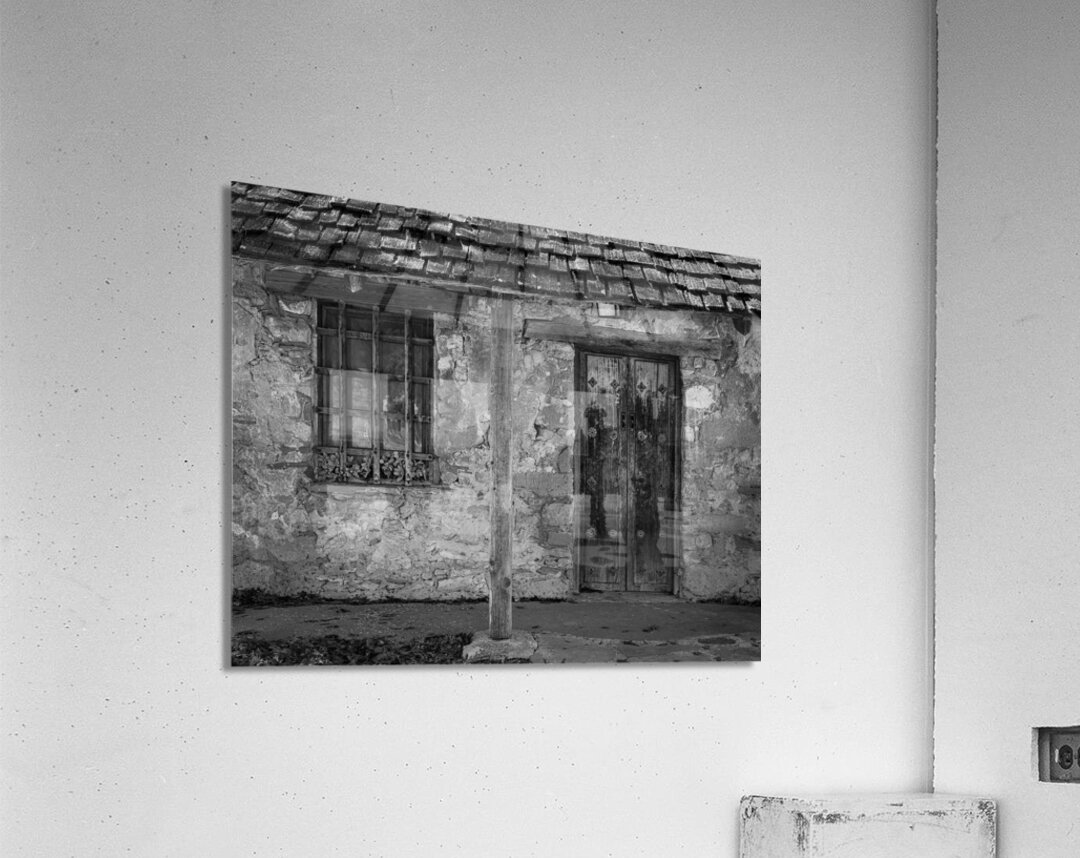 Rustic San Juan Mission building with an aged stone facade. Acrylic Print