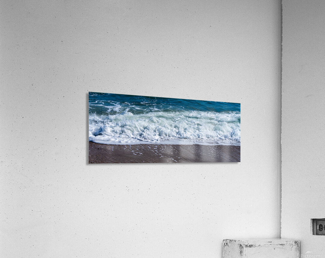 Frozen motion of waves crashing onto a pebble beach on the Isle  Acrylic Print