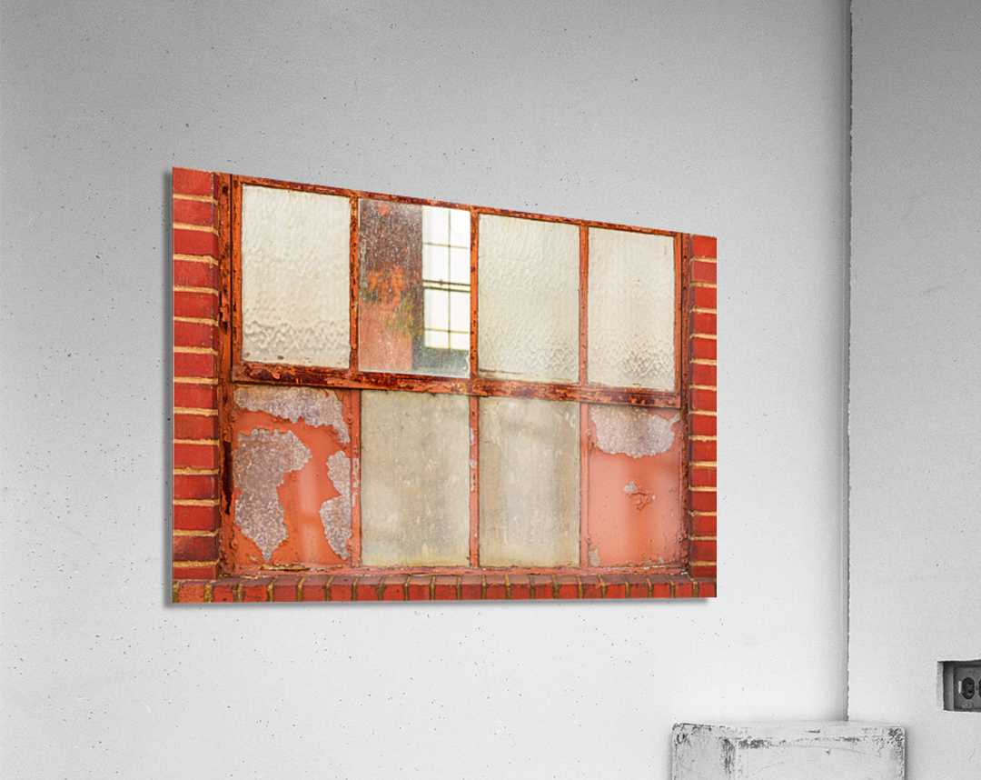 Old rusty window in warehouse painted red and orange Acrylic Print