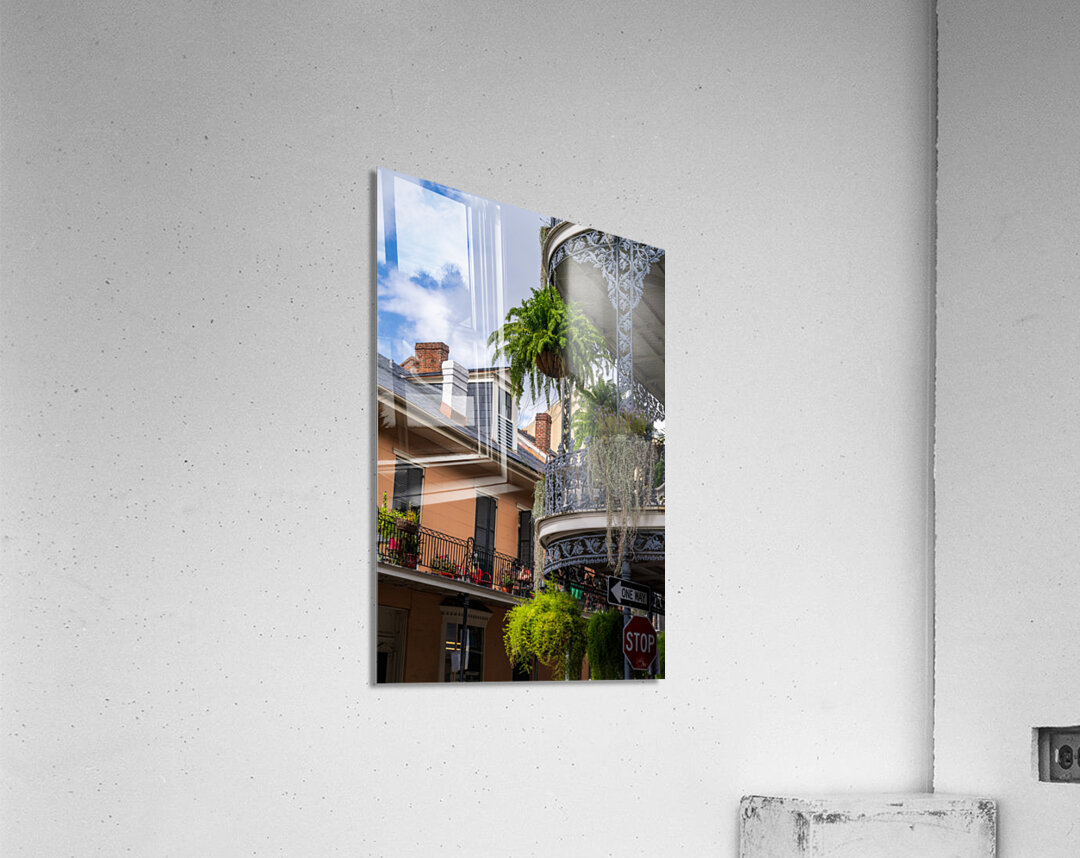 Traditional wrought iron balcony on brick New Orleans house Acrylic Print