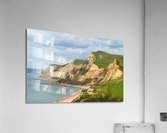 Cottage by cliffs at West Bay Dorset in UK  Acrylic Print