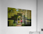 Azaleas and Rhododendron trees surround gateway in spring  Acrylic Print