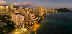 Aerial view of Waikiki beach towards Diamond Head at sunset 