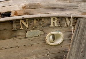 Detail of abandoned fishing boat by ocean at Icy Strait Point