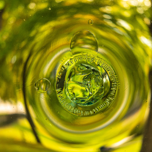 Old crown glass pane reflected warm garden