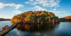 Aerial view with reflection of fall leaves in Cheat Lake Park