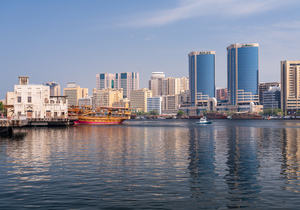 The Creek by Bur Dubai and Al Seef with large docked cruise boat