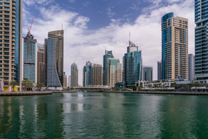 Modern buildings crowd the waterfront at Dubai Marina UAE