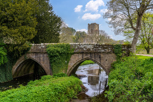 Stone bridge at Fountains Abbey ruins in Yorkshire England
