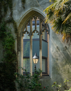 London street light seen through old windows of St Dunstan