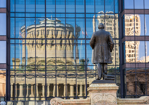 Reflection of McKinley statue and State Capitol building in Colu