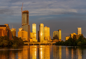 Waterline dominates city skyline of Austin Texas at sunset in 20