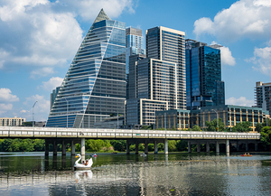 Cityscape of offices in Austin Texas across Lady Bird Lake