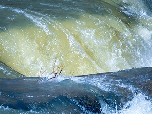 Frozen motion of raging water flowing over Valley Falls