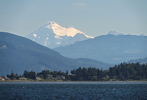 Shades of blue with Mt Baker in misty distance behind Samish Isl