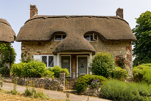 Pair of cute thatched cottages on hill in Godshill on the Isle o