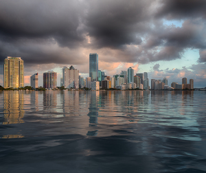 Dawn view of Miami Skyline reflected in water