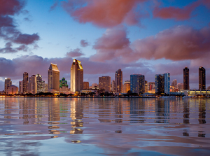 San Diego skyline at dusk reflected in sea