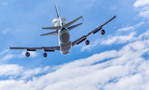 Space Shuttle Discovery flies over Washington DC