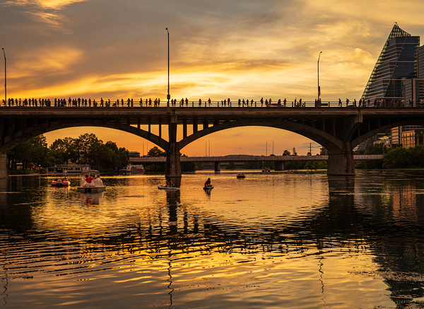 Bat watchers crowd on Congress Avenue bridge waiting for bats Print