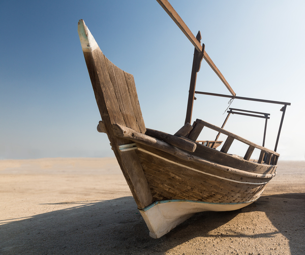 Fishermans boat or dhow on sand by Steve Heap