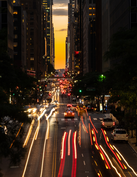 Traffic streams on 42nd street in NY after sunset by Steve Heap