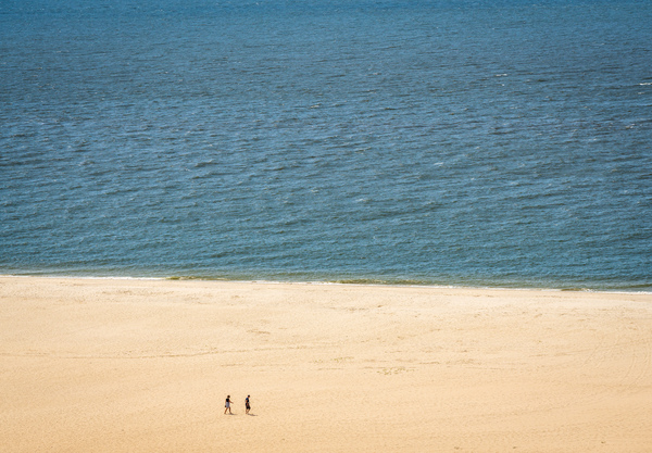 Single couple on wide beach at Cape May Point by Steve Heap