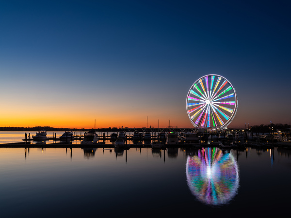 Ferris wheel at National Harbor at sunset by Steve Heap