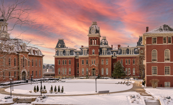 Sunset over snow covered Woodburn Hall at WVU by Steve Heap