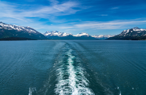 Cruise boat wake leaving town of Valdez in Alaska by Steve Heap