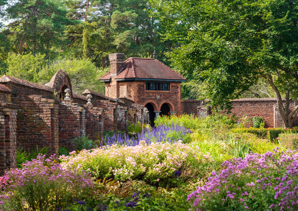 Brick walled garden for vegetables and flowers at Fort by Steve Heap