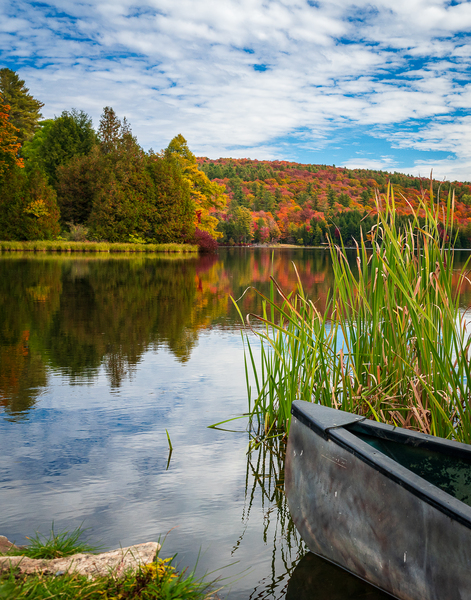 Canoe ready to launch in Silver Lake Vermont by Steve Heap