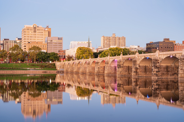 Reflections of Market Street bridge in the Susquehanna river by Steve Heap
