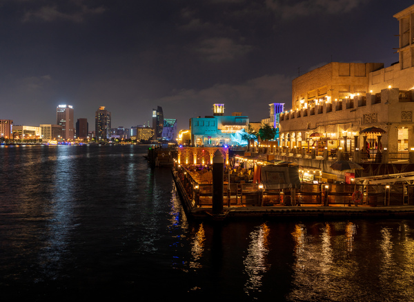 The Creek by Bur Dubai and Al Seef at night with waterfront rest by Steve Heap