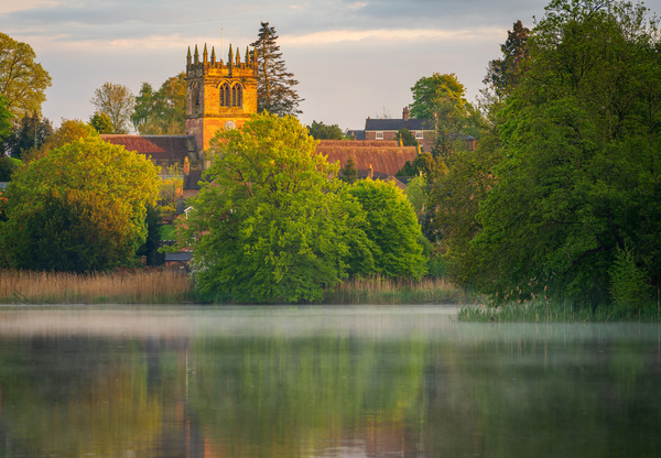 Sunset view across Ellesmere Mere in Shropshire to church by Steve Heap