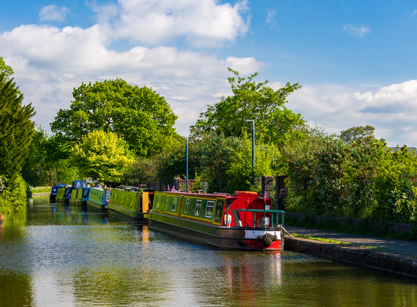 Colorful canal narrowboats in Ellesmere in Shropshire by Steve Heap