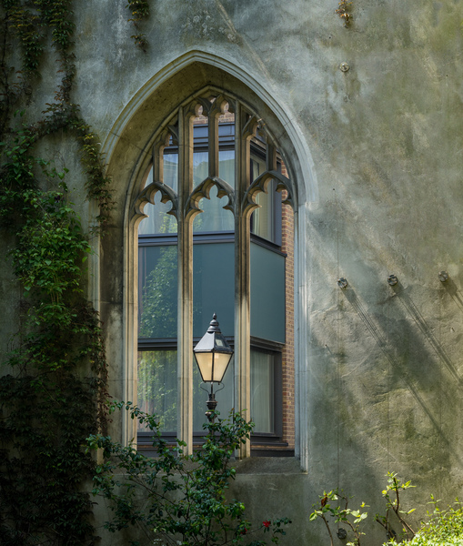 London street light seen through old windows of St Dunstan by Steve Heap
