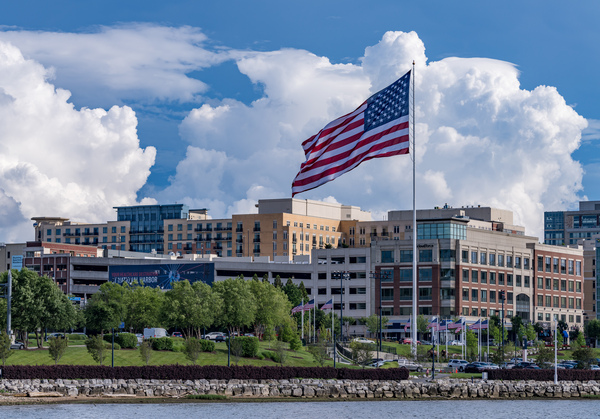 USA Flag flying at National Harbor in Maryland near Washington D by Steve Heap