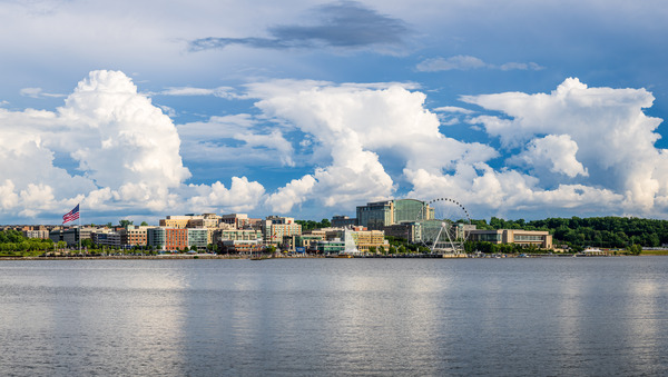 Dramatic clouds above National Harbor in Maryland near Washingto by Steve Heap