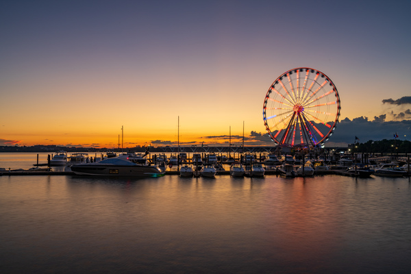 Ferris wheel at National Harbor at sunset by Steve Heap