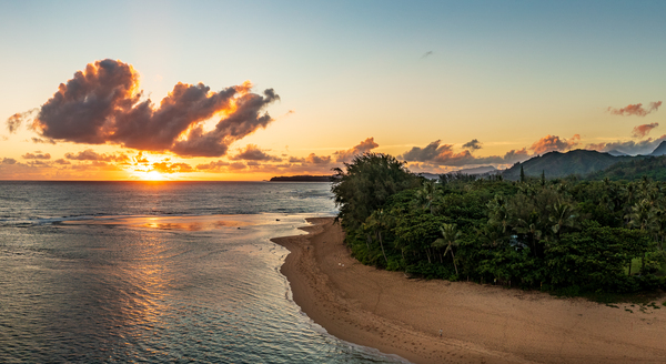 Aerial panorama of sunrise over Tunnels Beach Kauai Hawaii by Steve Heap