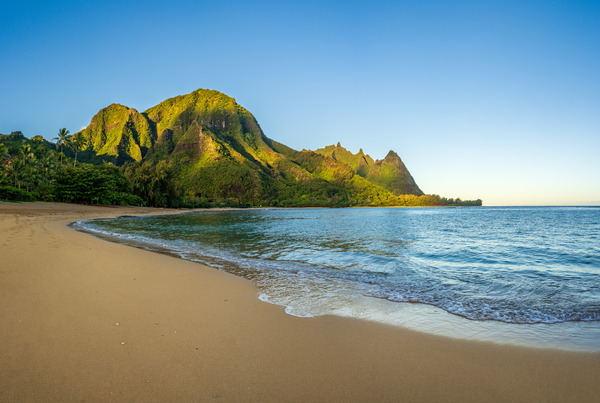 Early morning sunrise over Tunnels Beach on Kauai in Hawaii by Steve Heap