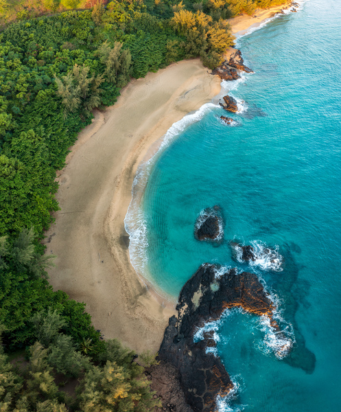 Top down view of rocks and waves on Lumahai beach Kauai by Steve Heap