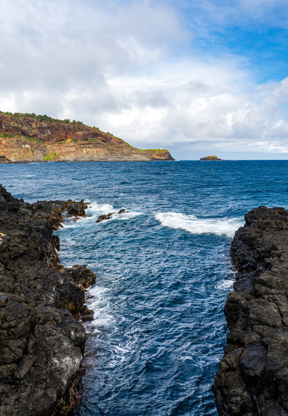 Kilauae lighthouse on headland seen from Mokolea Point by Steve Heap