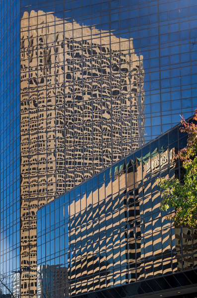 Complex reflections of a modern skyscrapers in St Louis office b by Steve Heap