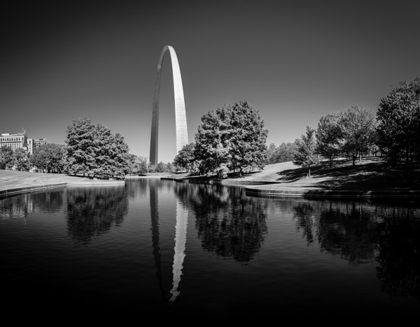 Monochrome Gateway Arch of St Louis Missouri reflecting in the l by Steve Heap