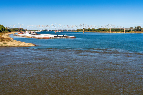 Blue clear water from Ohio river meets brown muddy Mississippi by Steve Heap