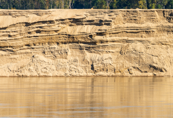 Exposed cliffs of sand by the side of Mississippi river in Octob by Steve Heap