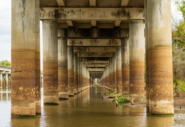 Supporting pillars of I-10 bridge above Atchafalaya basin in Lou by Steve Heap