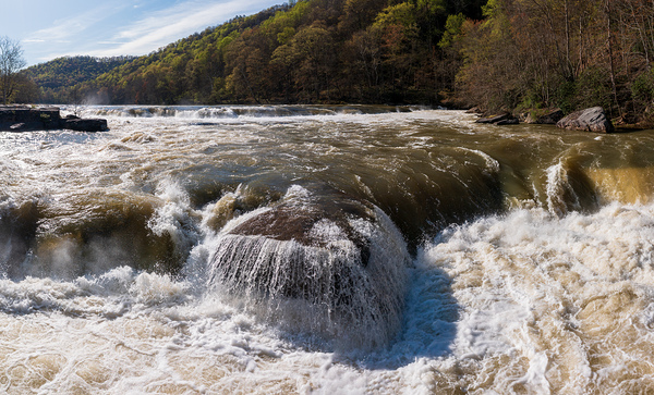Eye level view of raging flooded Valley Falls near Fairmont by Steve Heap